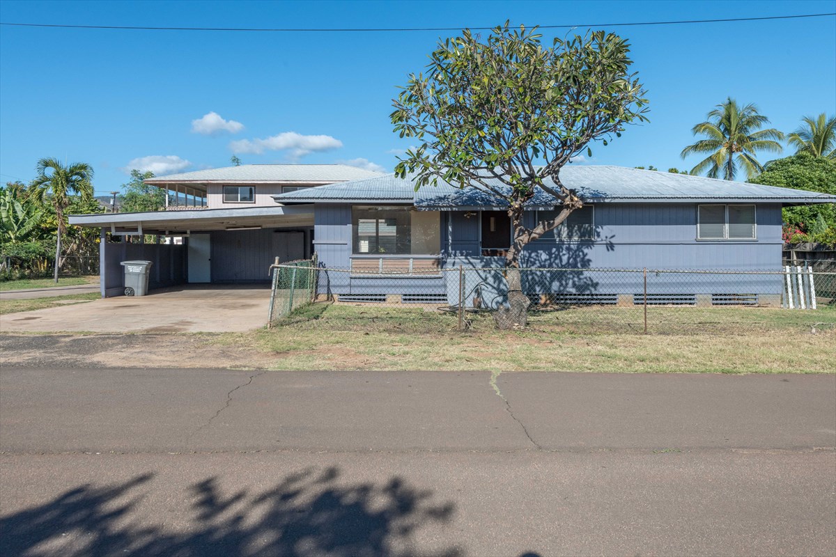 7921 Koae Road Kekaha, HI 96752 - Photo 3 of 25 a view of a house with a backyard