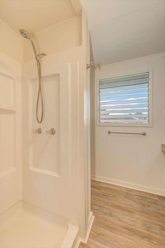 7921 Koae Road Kekaha, HI 96752 - Photo 10 of 25 a bathroom with a glass shower door