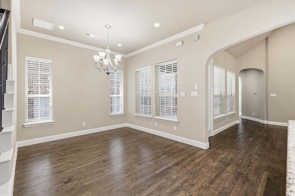768 Huntingdon Street Coppell, TX 75019 - Photo 19 of 37 Light-filled dining space with multiple windows, crisp trim, and an easy flow into the main living areas.