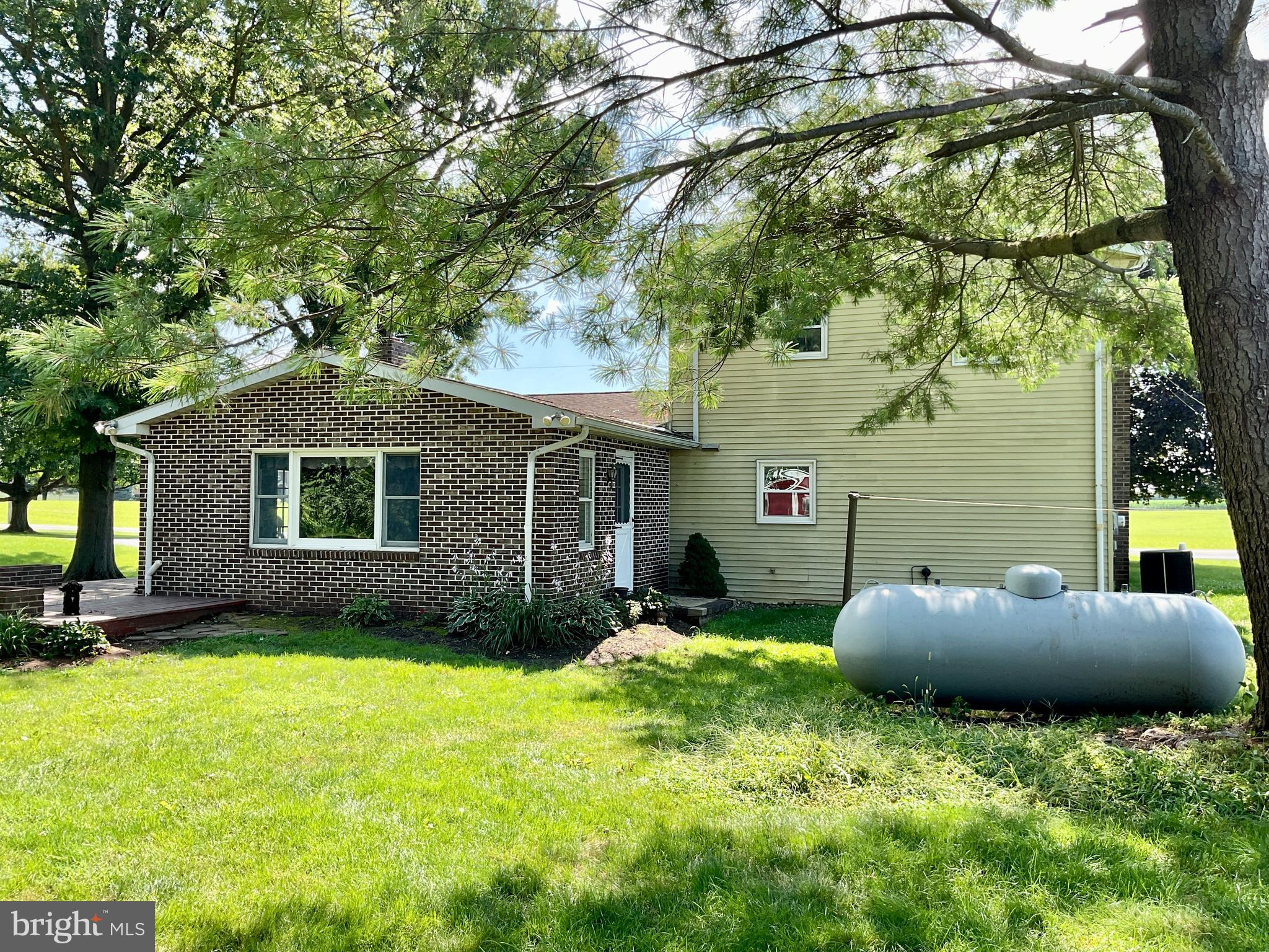 9 Buch Mill Road Lititz, PA 17543 - Photo 11 of 39 a backyard of a house with seating space
