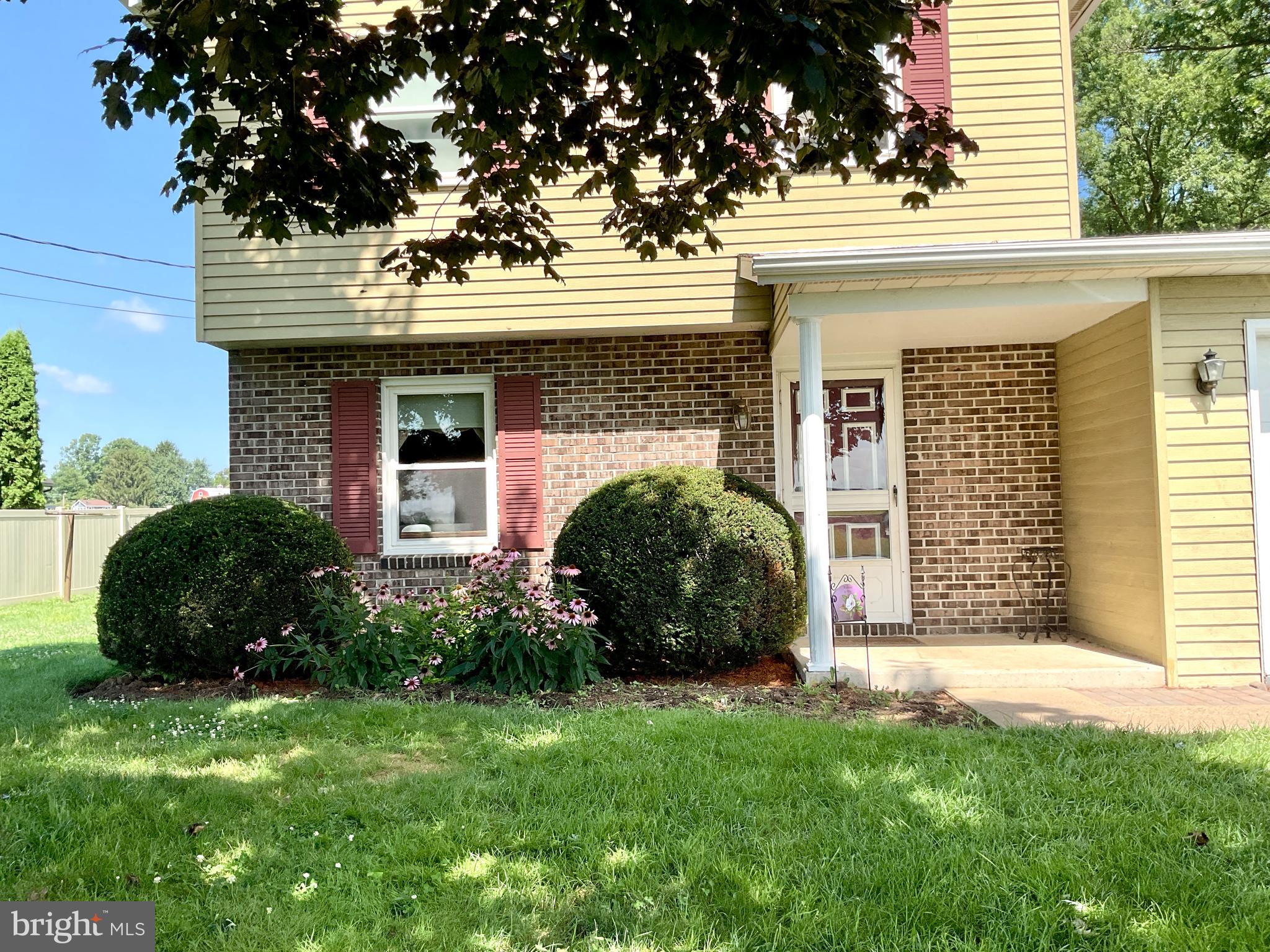 9 Buch Mill Road Lititz, PA 17543 - Photo 16 of 39 a front view of a house with garden