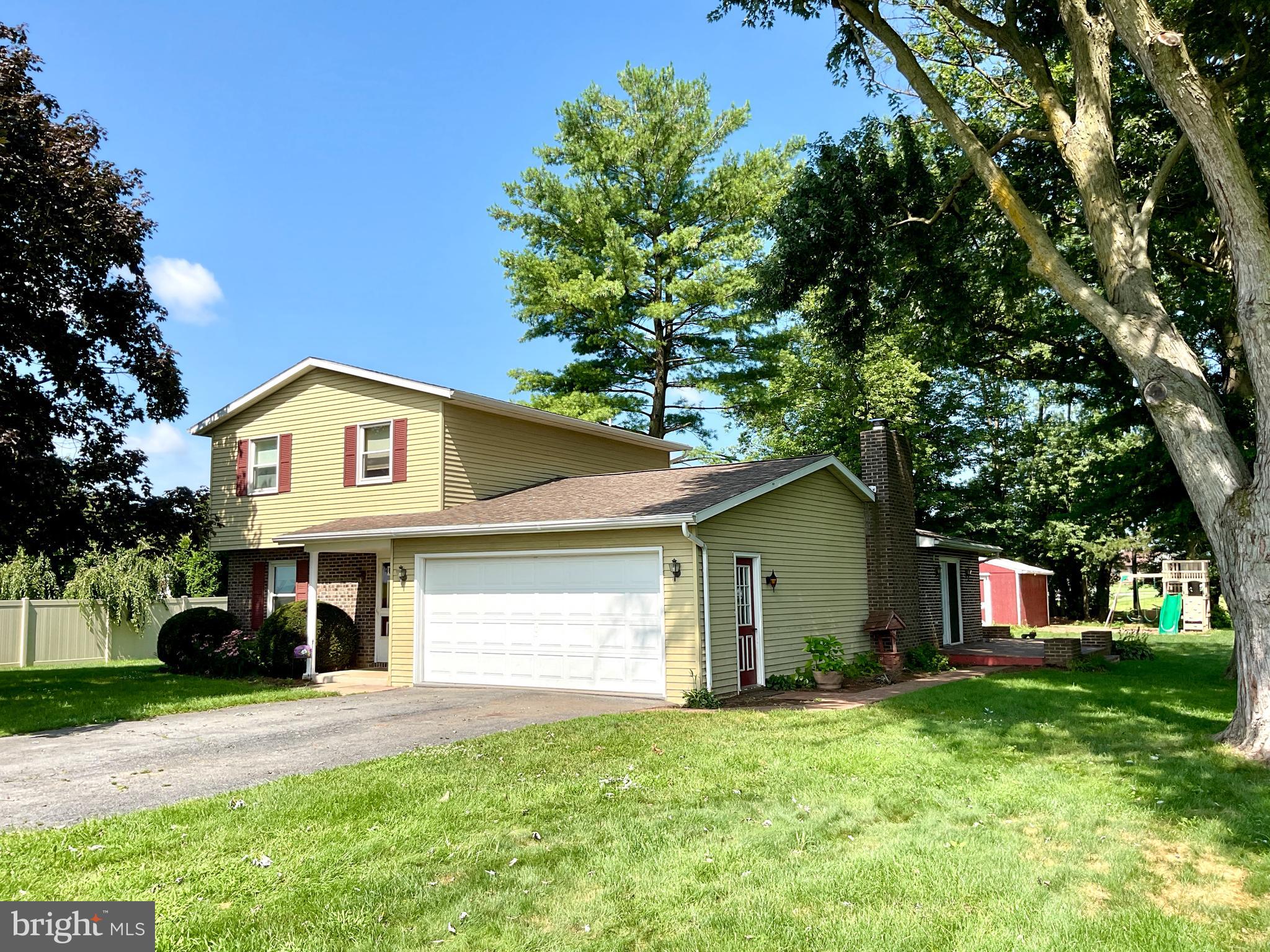 9 Buch Mill Road Lititz, PA 17543 - Photo 17 of 39 a view of a house with a yard and tree s
