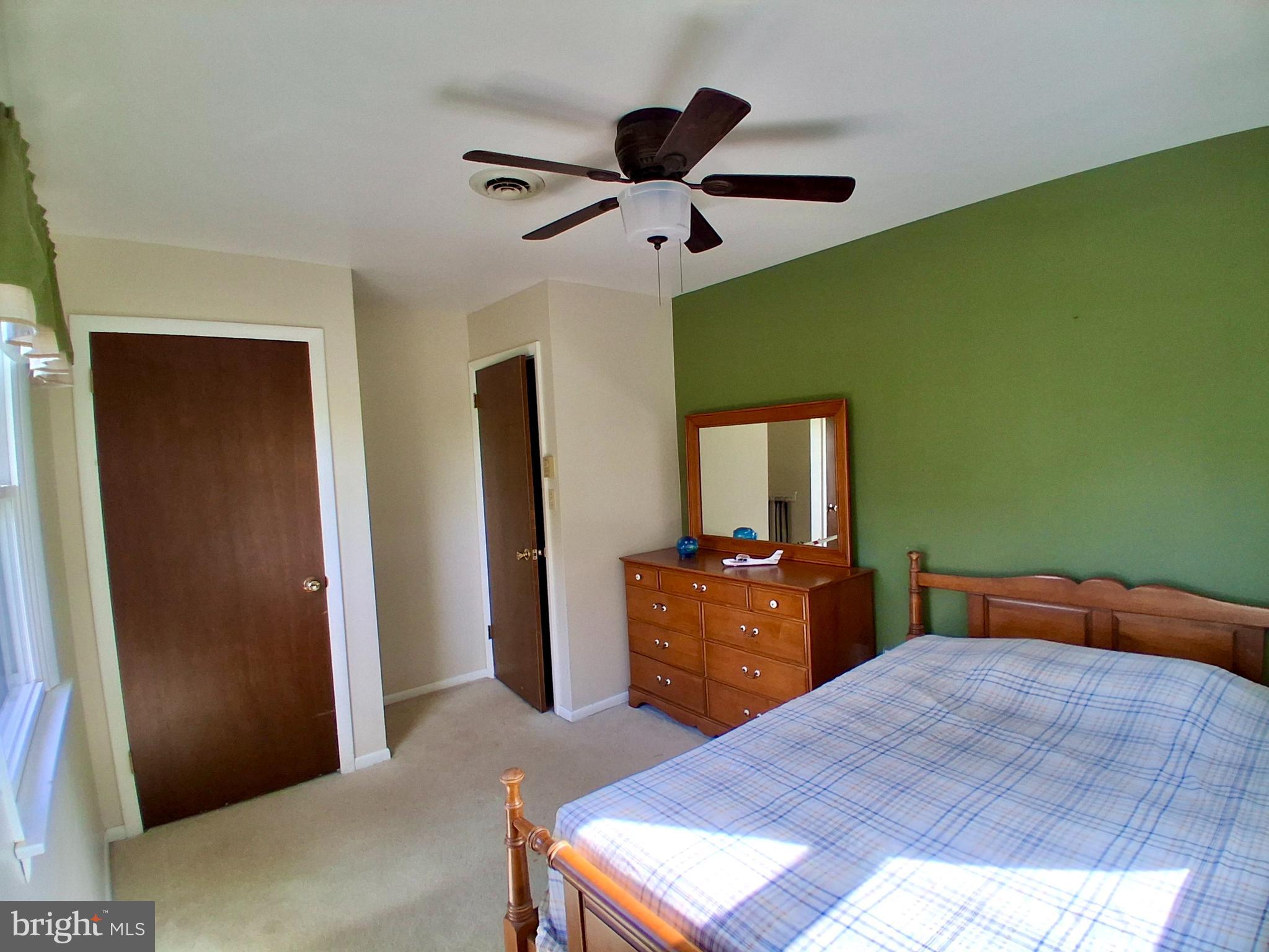 9 Buch Mill Road Lititz, PA 17543 - Photo 22 of 39 a bedroom with a bed and a dresser