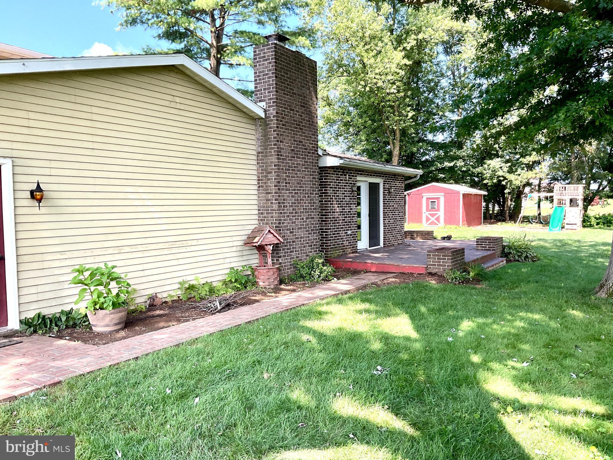 9 Buch Mill Road Lititz, PA 17543 - Photo 3 of 39 a front view of a house with garden