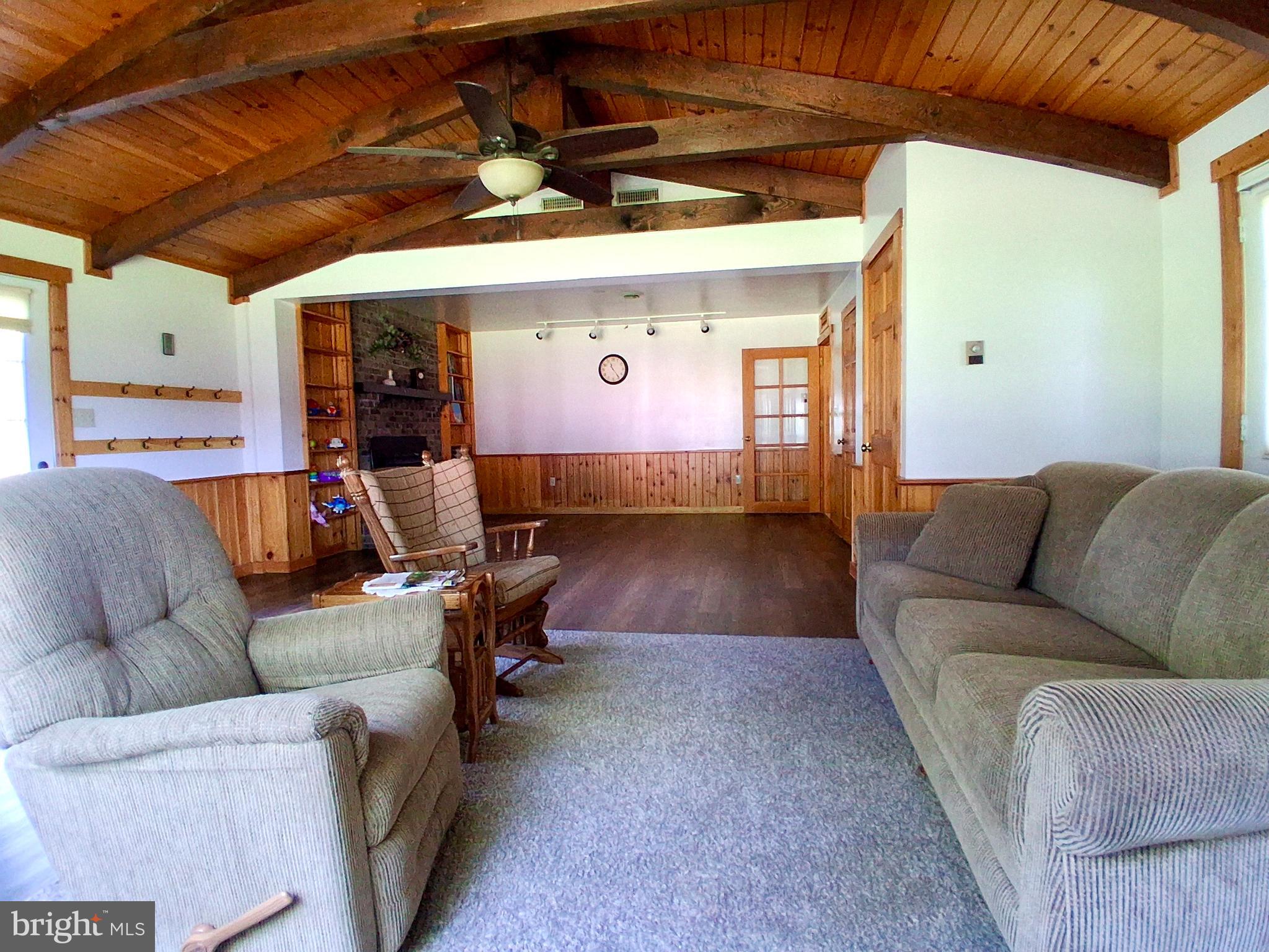9 Buch Mill Road Lititz, PA 17543 - Photo 33 of 39 a living room with furniture and a chandelier