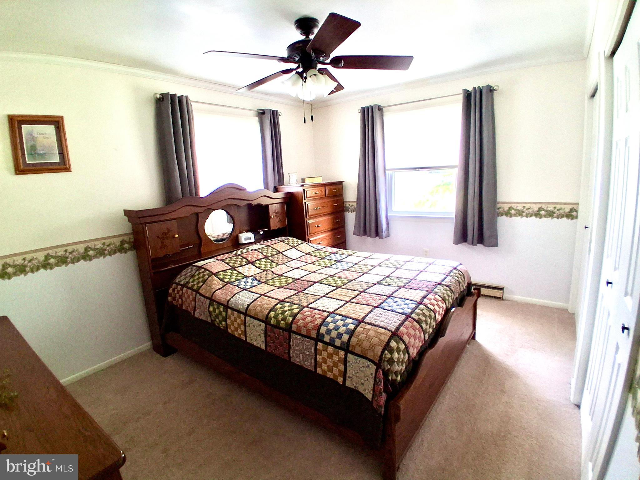 9 Buch Mill Road Lititz, PA 17543 - Photo 34 of 39 a bedroom with a bed mirror and window