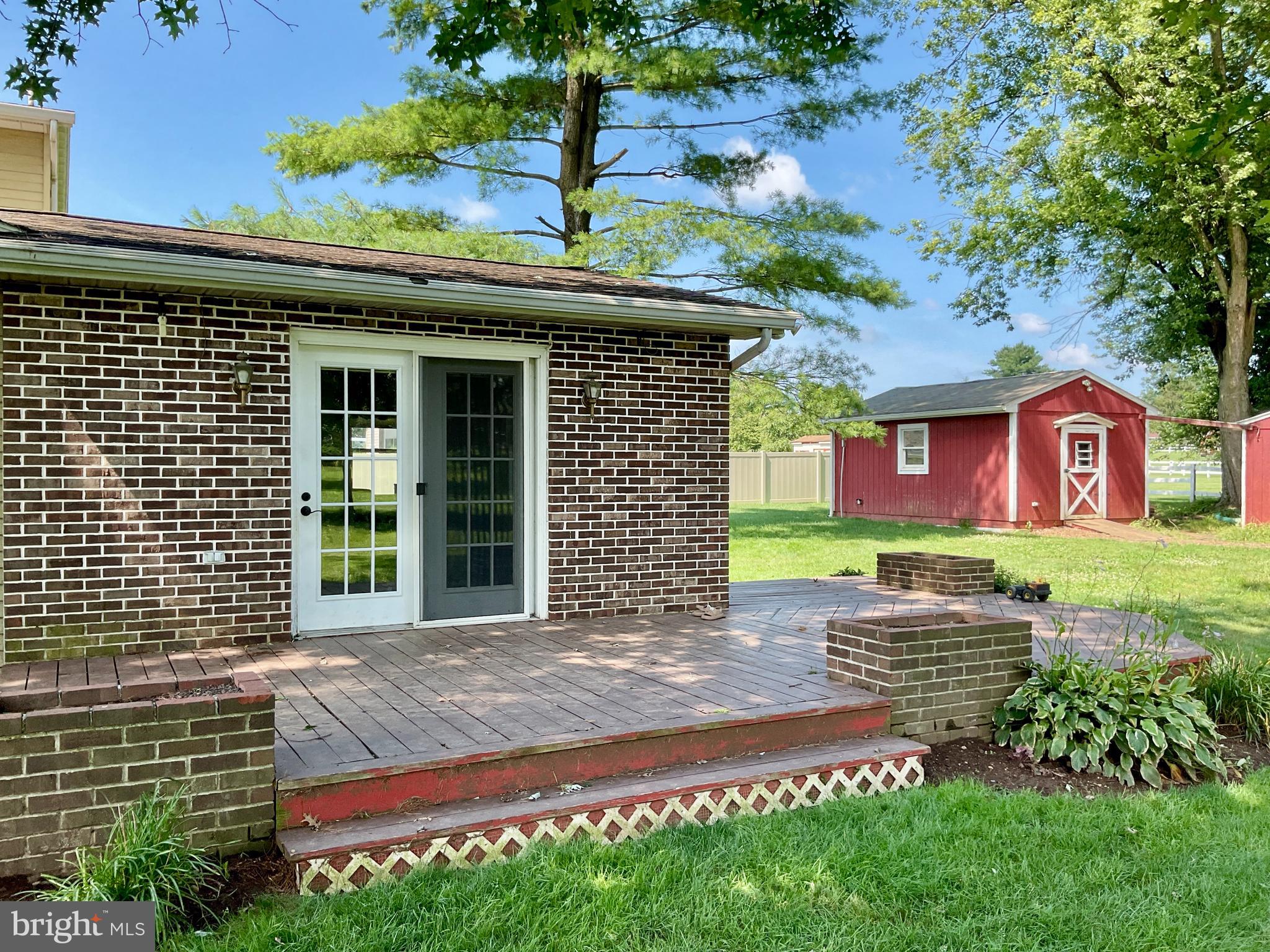 9 Buch Mill Road Lititz, PA 17543 - Photo 8 of 39 a front view of a house with garden