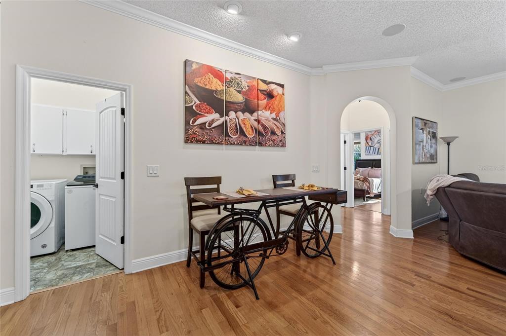 3522 Fox Squirrel Lane Valrico, FL 33596 - Photo 32 of 82 a view of a a dining room with furniture window and wooden floor