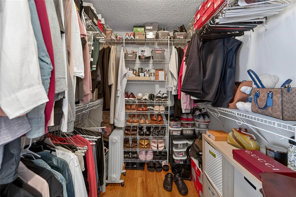 3522 Fox Squirrel Lane Valrico, FL 33596 - Photo 46 of 82 a view of walk in closet with clothes and shoes