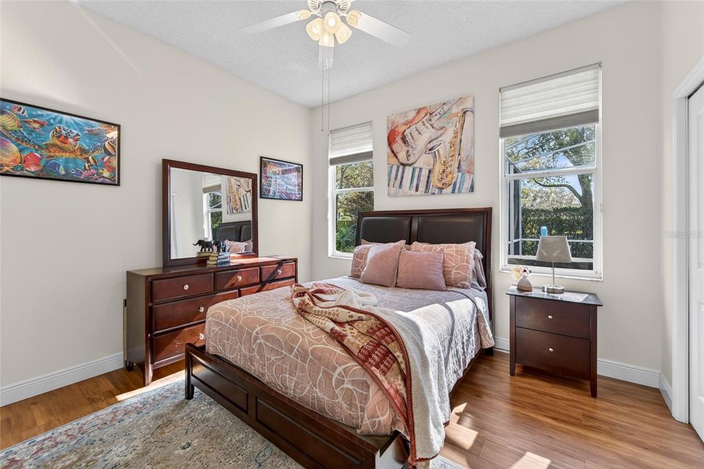 3522 Fox Squirrel Lane Valrico, FL 33596 - Photo 48 of 82 a bedroom with a bed and a dresser