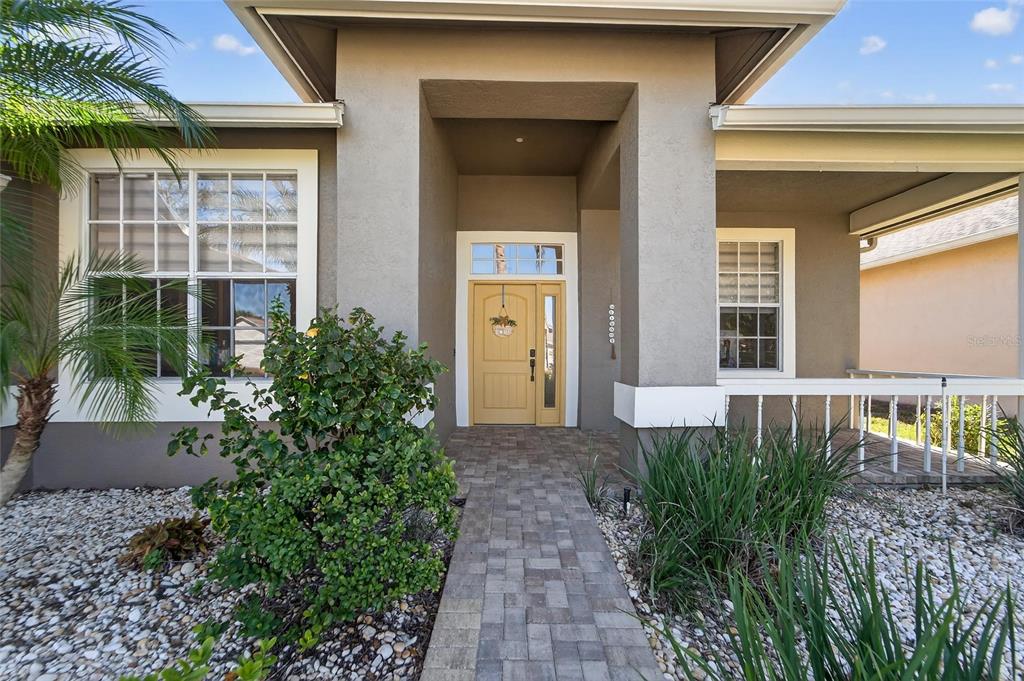 3522 Fox Squirrel Lane Valrico, FL 33596 - Photo 5 of 82 a front view of a house with a yard