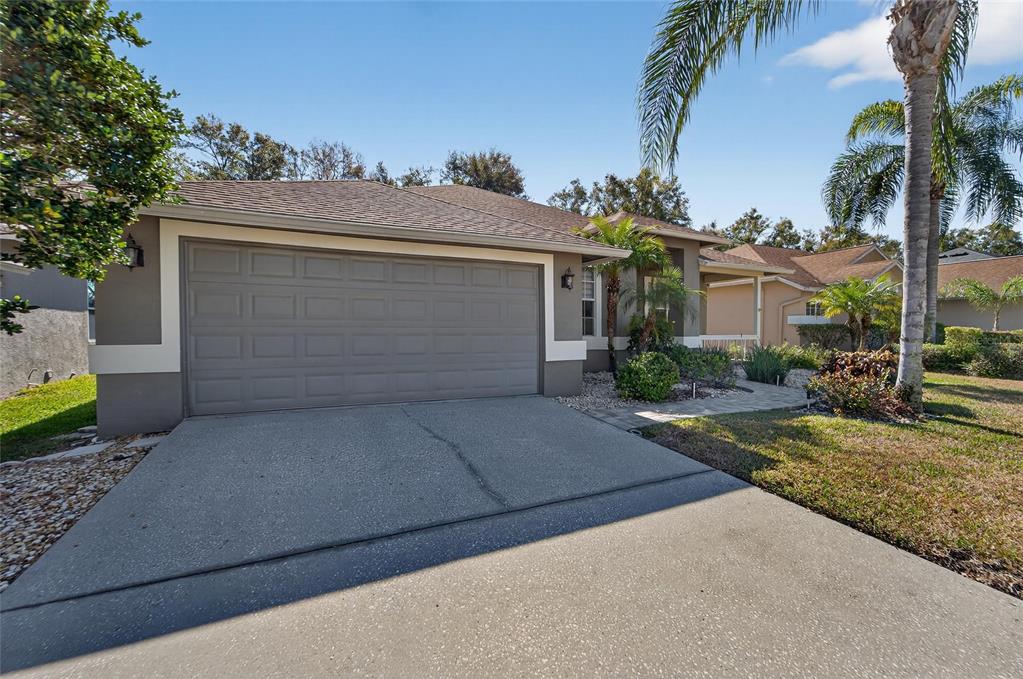 3522 Fox Squirrel Lane Valrico, FL 33596 - Photo 9 of 82 front view of a house with a yard