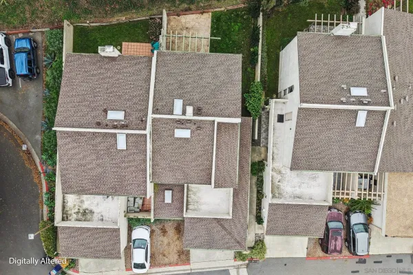 a view of a swimming pool with a yard