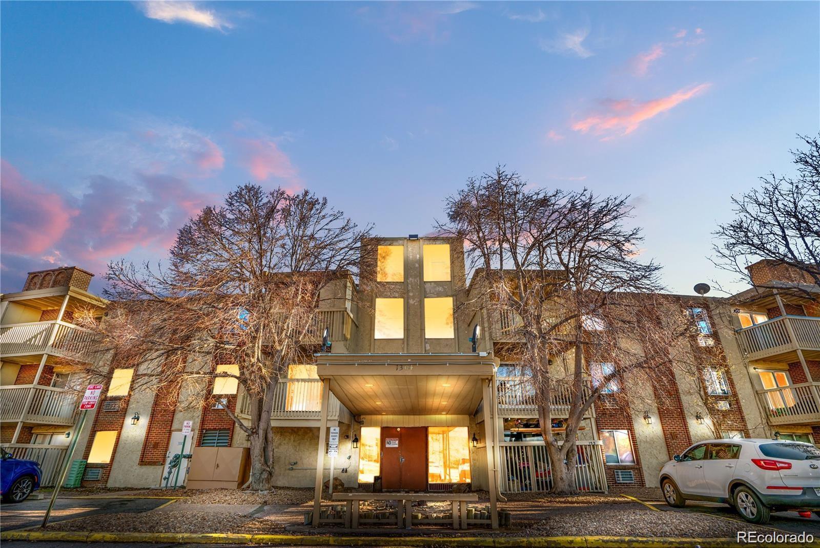 1302 South Parker Road, Unit 229 Denver, CO 80231 - Photo 13 of 18 a front view of a building