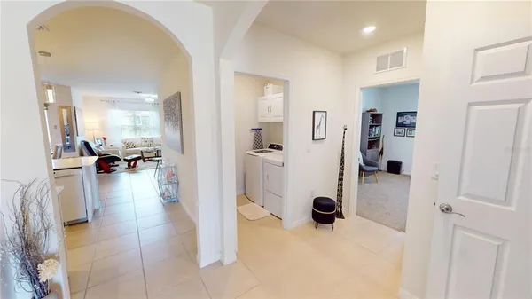 a room with furniture and air hockey table