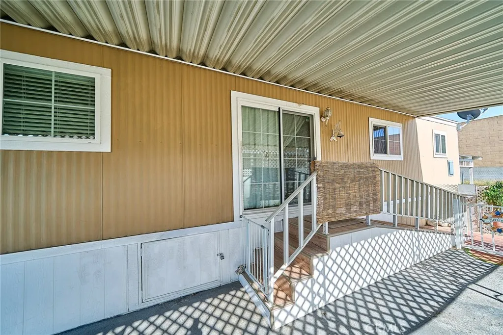 4000 Pierce Street, Unit 168 Riverside, CA 92505 - Photo 21 of 34 a view of a house with wooden deck
