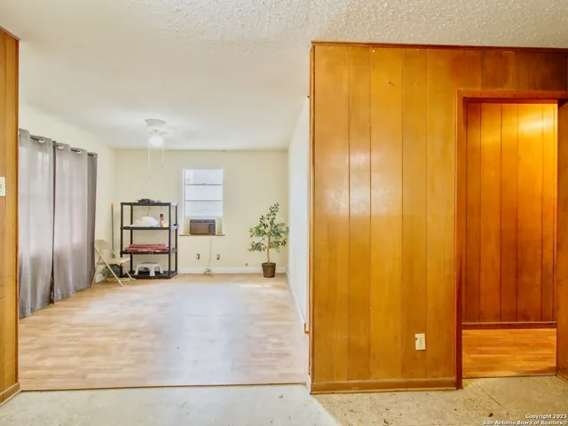 a view of a room with a door