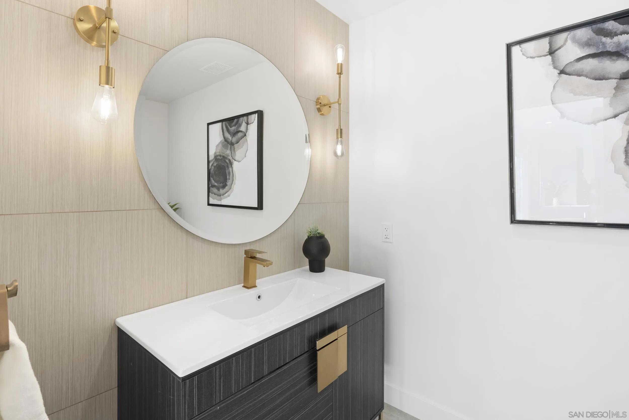 17515 Circa Oriente Rancho Santa Fe, CA 92067 - Photo 26 of 37 a bathroom with a sink mirror and vanity