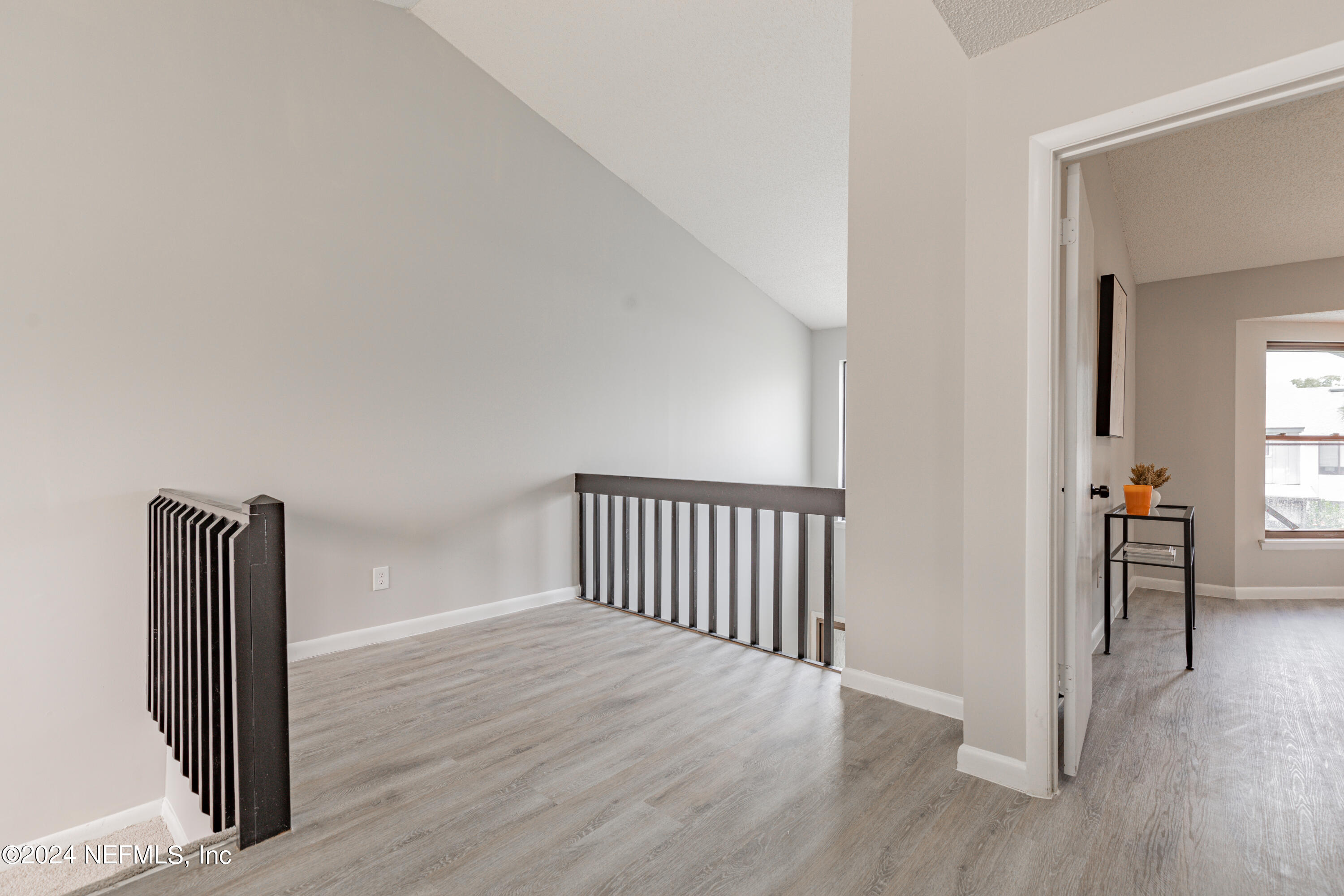 9360 Craven Road, Unit 504 Jacksonville, FL 32257 - Photo 20 of 28 a view of livingroom with furniture and wooden floor