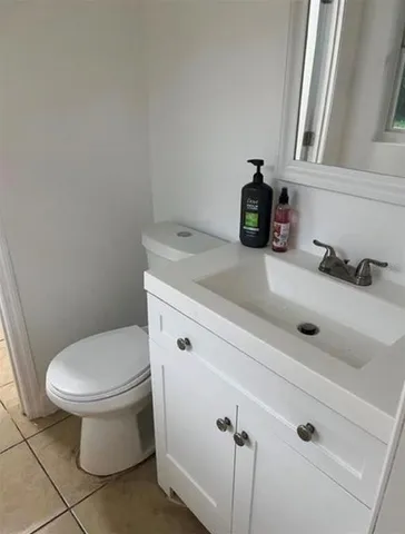 a bathroom with a sink and a toilet
