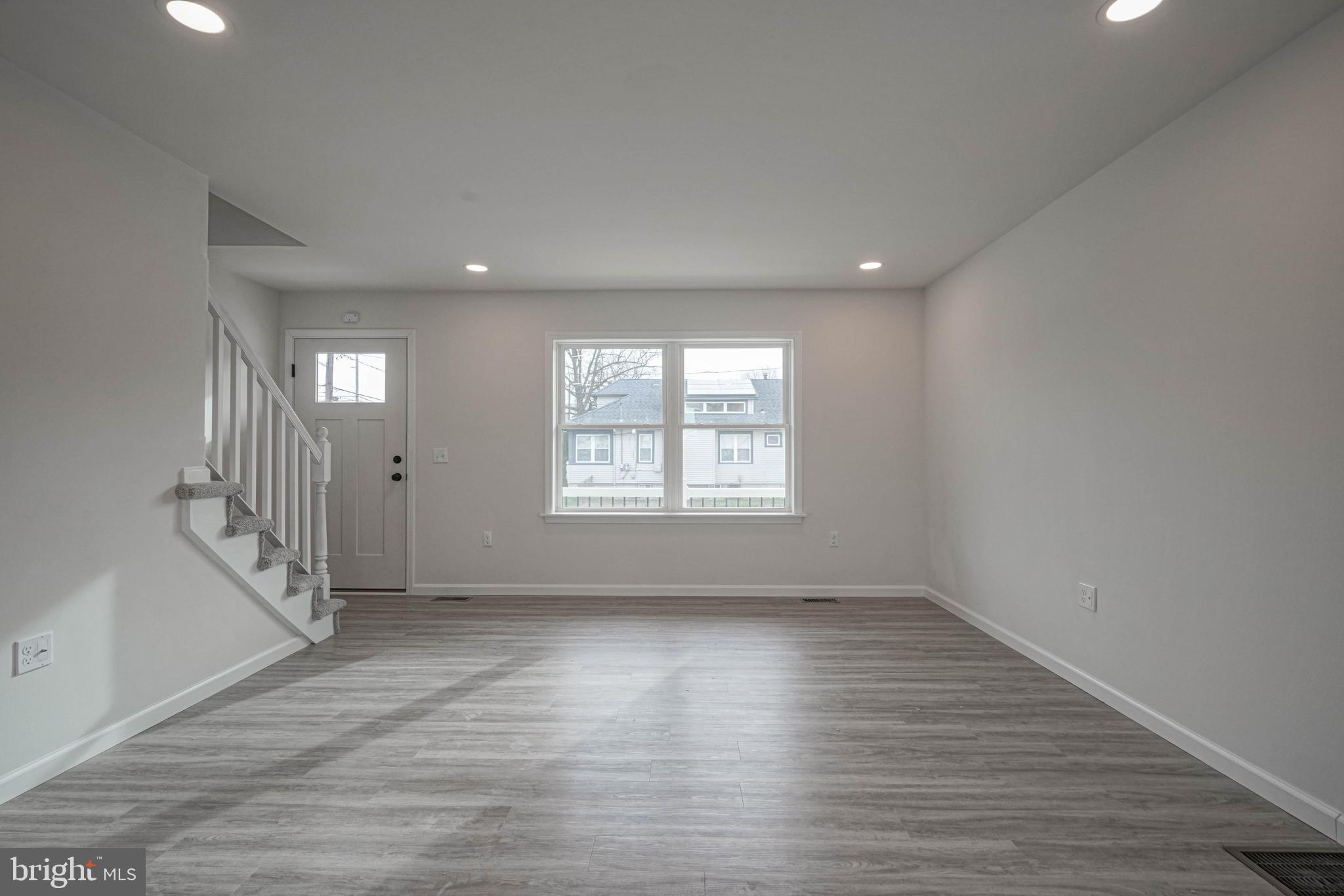 5 Myrtle Avenue Gloucester City, NJ 08030 - Photo 27 of 51 wooden floor in an empty room with a window