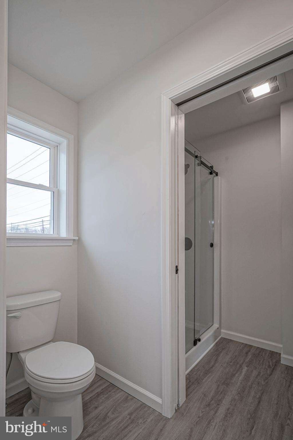 5 Myrtle Avenue Gloucester City, NJ 08030 - Photo 30 of 51 a bathroom with a toilet and a shower