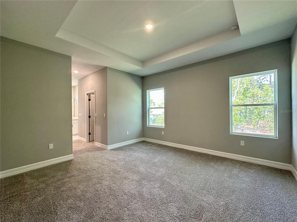 13081 Southwest 78th Circle Ocala, FL 34473 - Photo 9 of 22 an empty room with windows