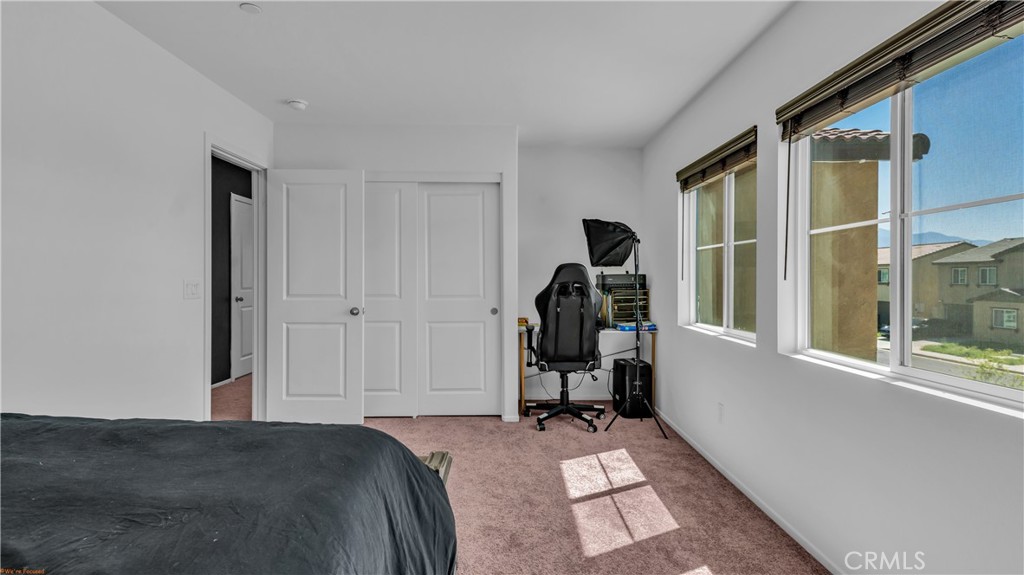 2271 Linden Lane Banning, CA 92220 - Photo 20 of 38 a view of bedroom with furniture and a window