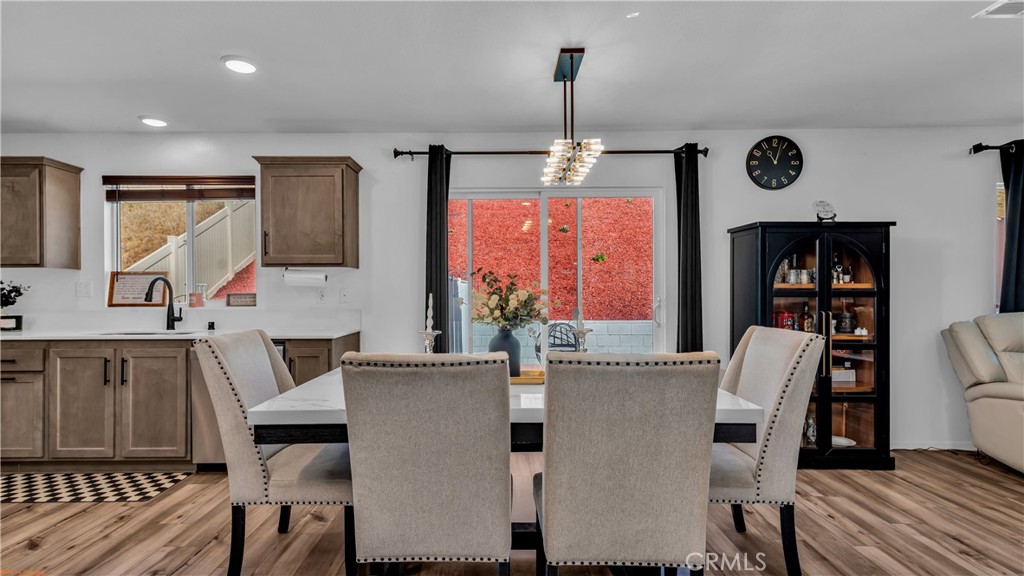 2271 Linden Lane Banning, CA 92220 - Photo 6 of 38 a dining room with furniture and window