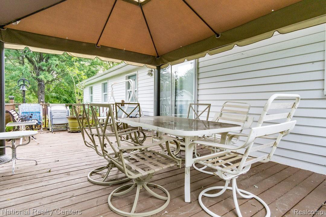 1615 East Wattles Road Troy, MI 48085 - Photo 25 of 25 Large deck with cover