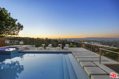 a view of a terrace with a lake view