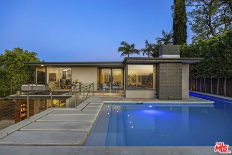 a view of backyard with green space