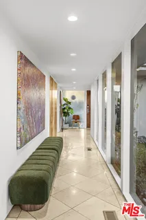 a kitchen with sink cabinets and stove top oven