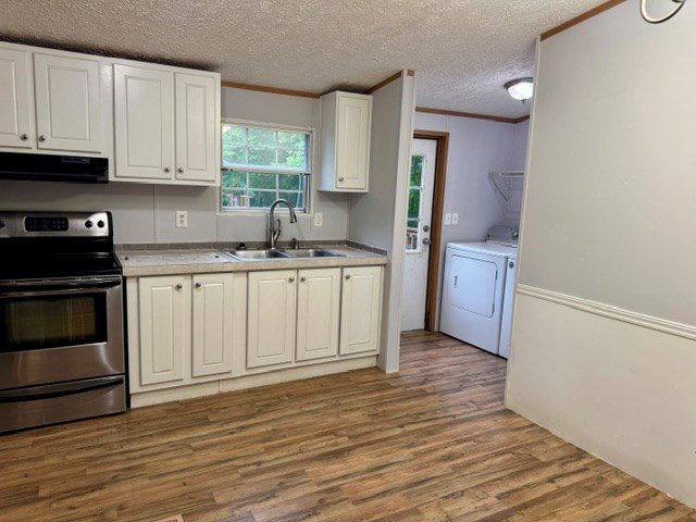 385 V C Pk Road Marble, NC 28905 - Photo 7 of 19 a kitchen with stainless steel appliances granite countertop a stove a sink and a refrigerator