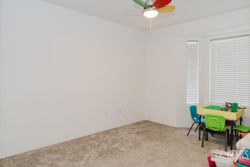 Undisclosed Address Bakersfield, CA 93308 - Photo 23 of 45 a workspace with furniture and a window