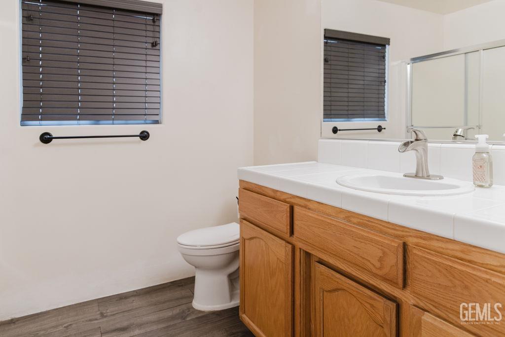 Undisclosed Address Bakersfield, CA 93308 - Photo 27 of 45 a bathroom with a sink and a toilet