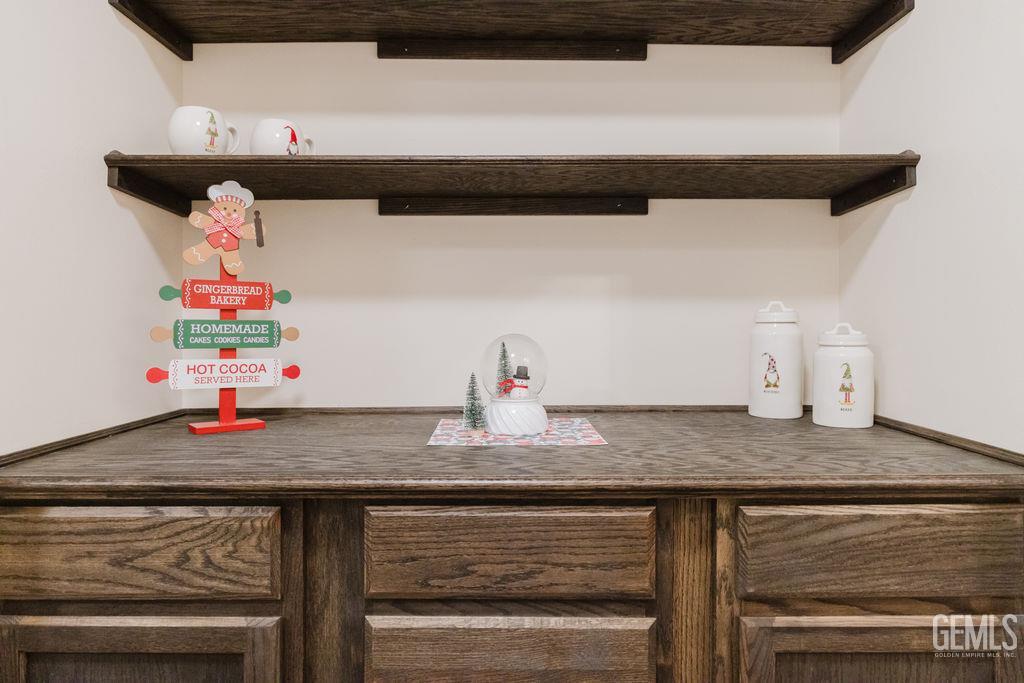 Undisclosed Address Bakersfield, CA 93308 - Photo 36 of 45 a kitchen with a sink and cabinets