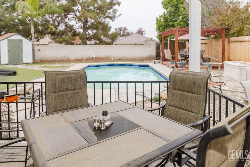 Undisclosed Address Bakersfield, CA 93308 - Photo 37 of 45 a balcony with furniture and wooden floor