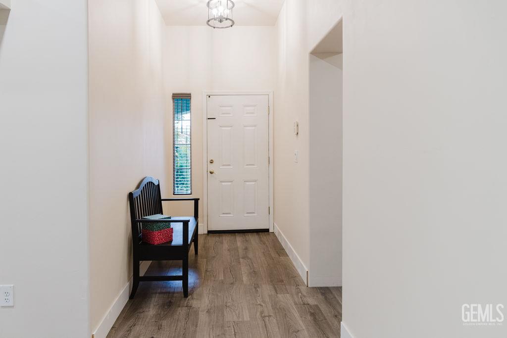 Undisclosed Address Bakersfield, CA 93308 - Photo 4 of 45 a view of a livingroom with wooden floor and a sink