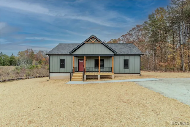 a house with trees in the background