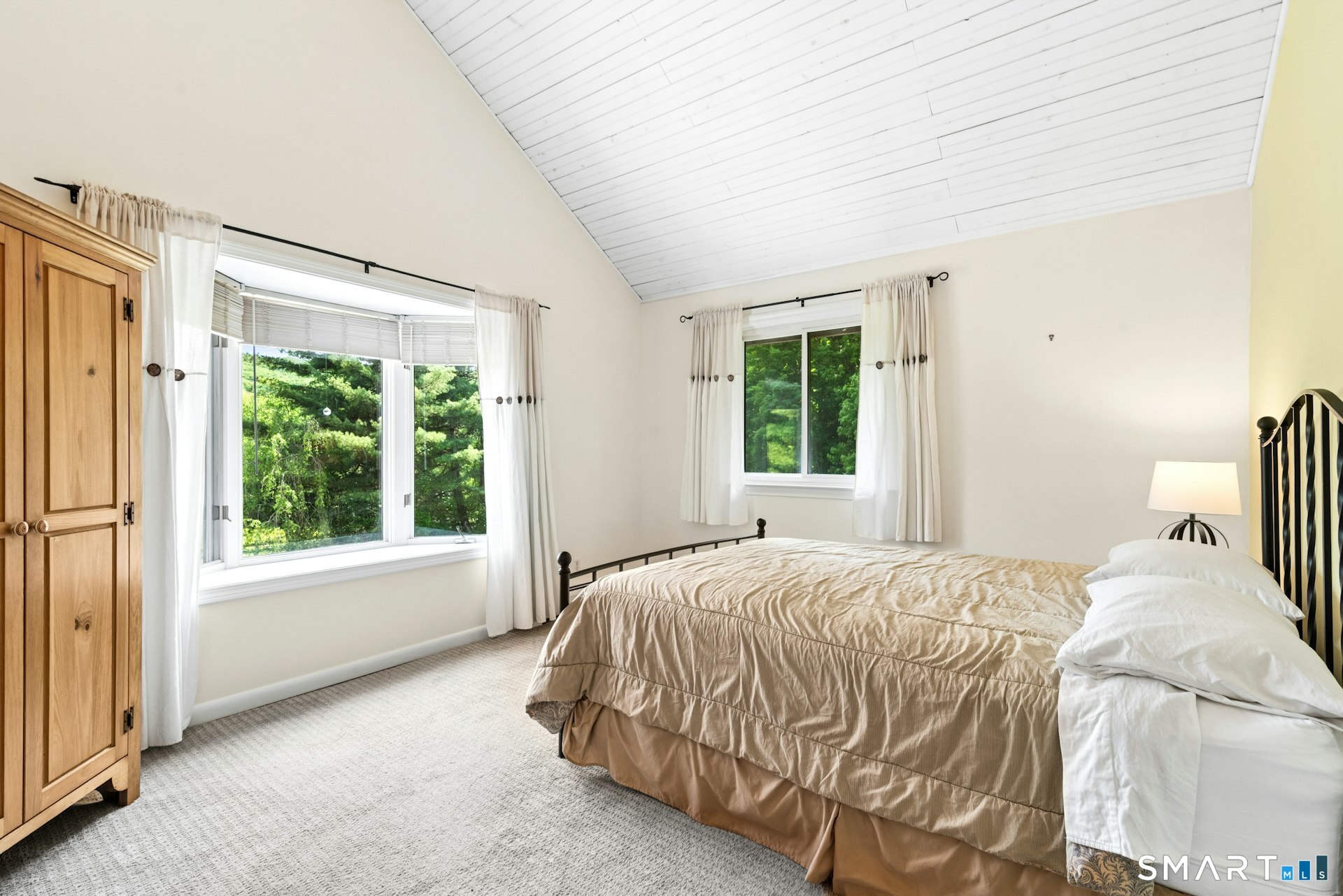 127 Huntingtown Road Newtown, CT 06470 - Photo 17 of 38 a bedroom with a bed and a window