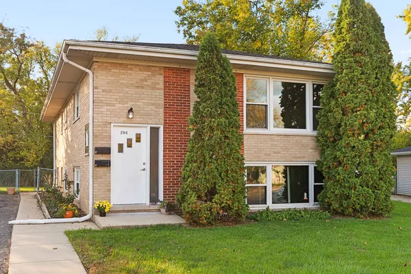 front view of house with a yard
