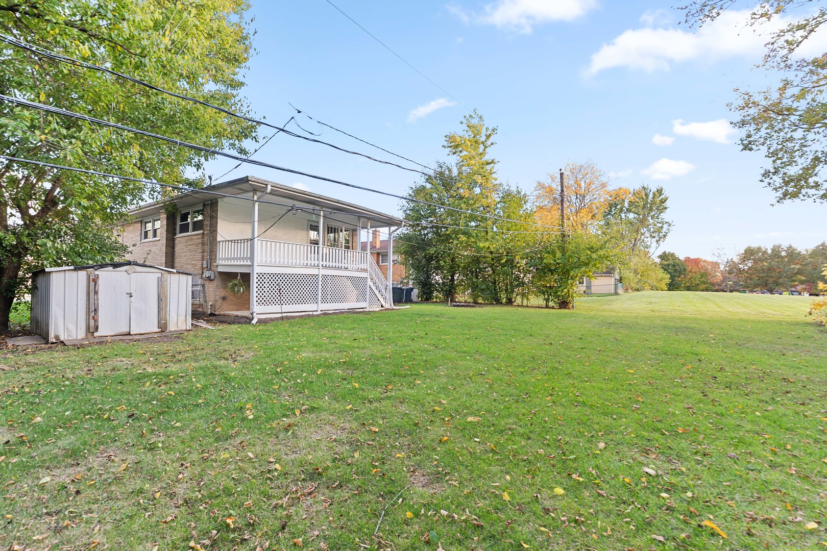 286 Wayne Court, Unit 2 Bartlett, IL 60103 - Photo 25 of 26 a view of a house with a yard