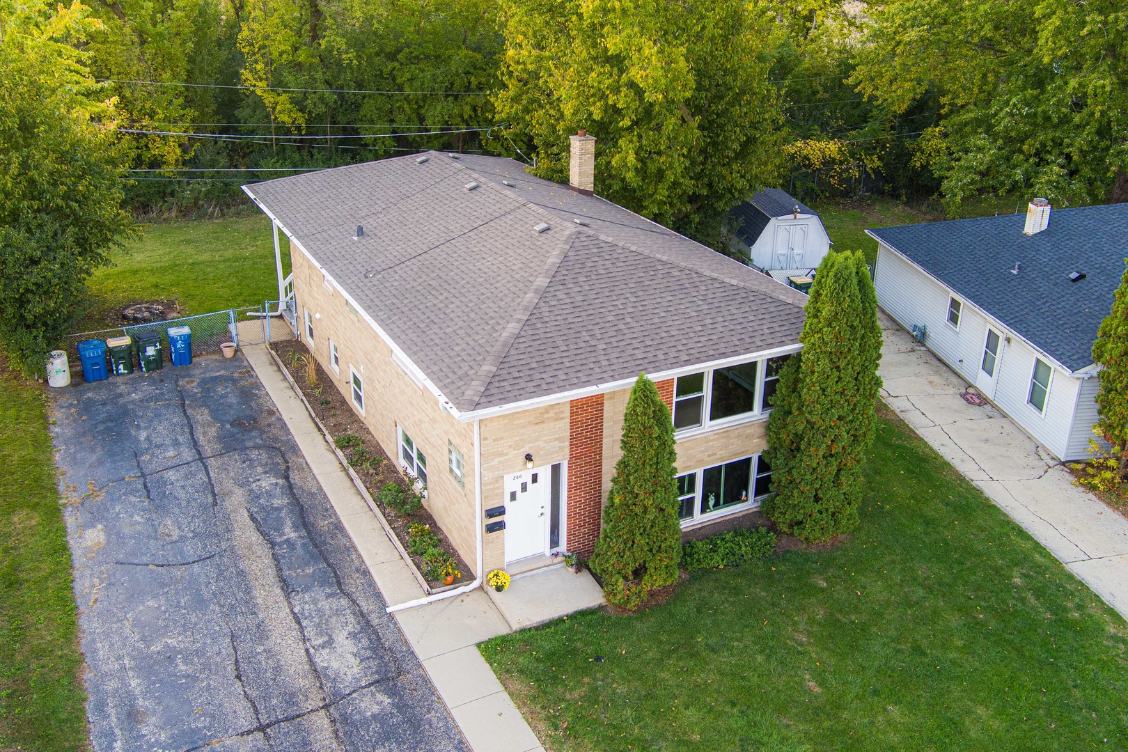 286 Wayne Court, Unit 2 Bartlett, IL 60103 - Photo 3 of 26 a aerial view of a house next to a big yard