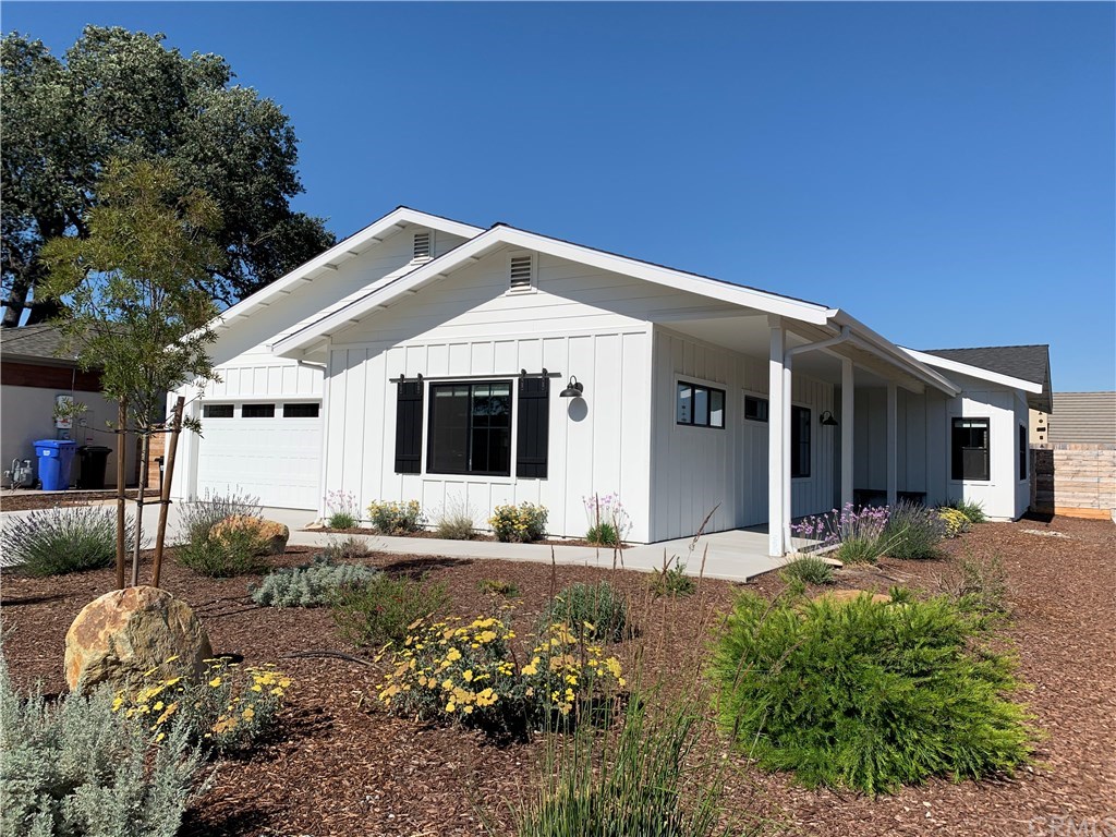 196 Rowan Way Templeton, CA 93465 - Photo 1 of 32 a front view of a house with a yard