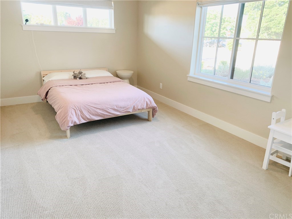 196 Rowan Way Templeton, CA 93465 - Photo 23 of 32 a bedroom with a bed and a window