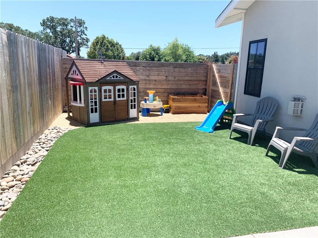 196 Rowan Way Templeton, CA 93465 - Photo 31 of 32 a view of a house with backyard and a hammock