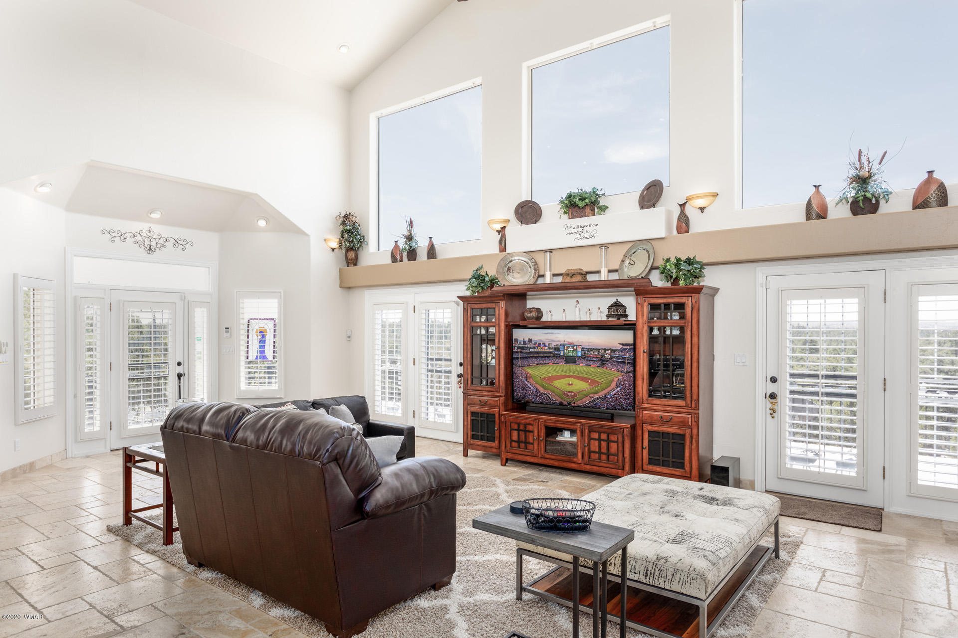 2974 Ranch House Road Overgaard, AZ 85933 - Photo 15 of 46 a living room with furniture and a flat screen tv