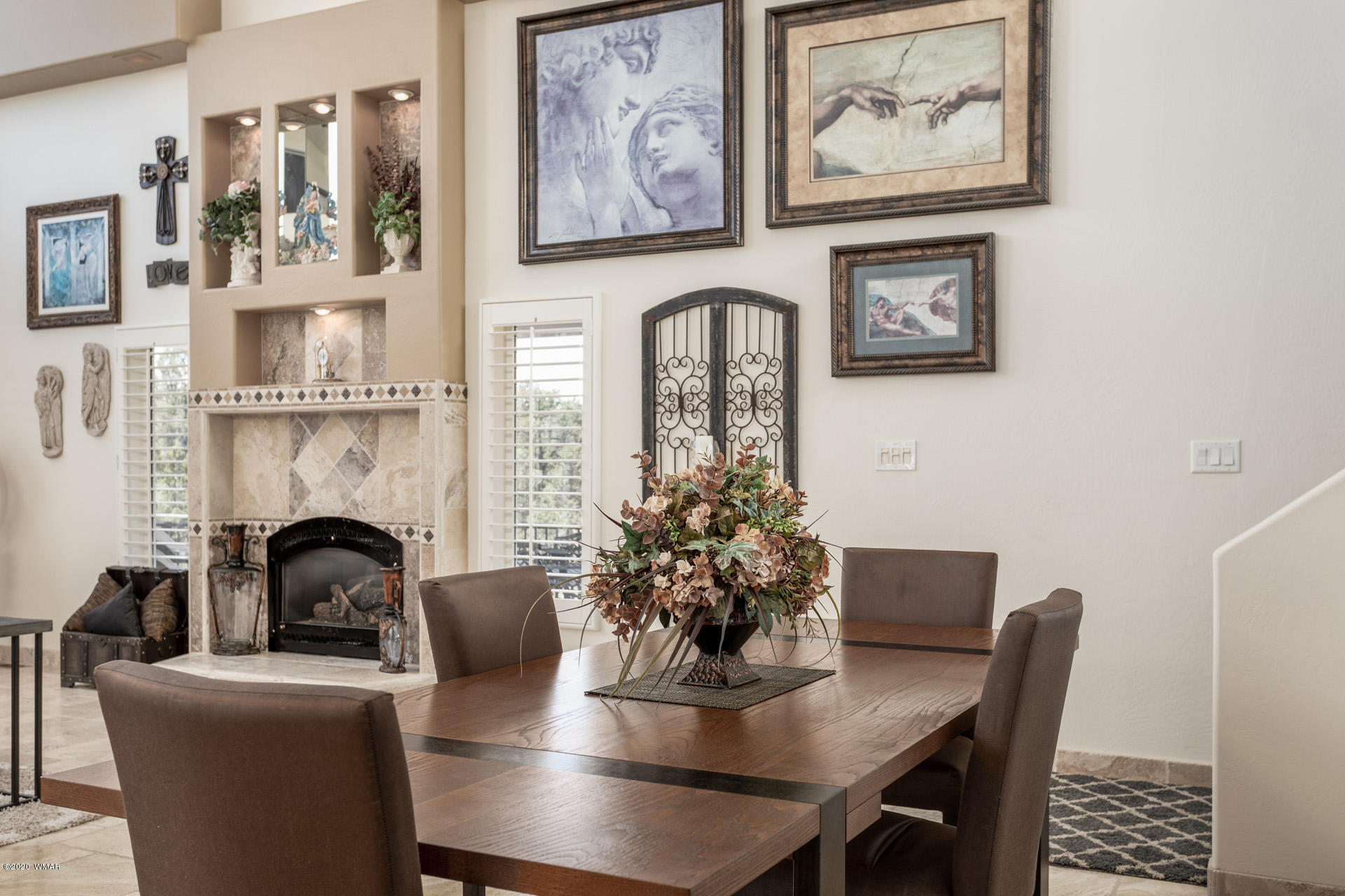 2974 Ranch House Road Overgaard, AZ 85933 - Photo 26 of 46 a view of a dining room with furniture and chandelier