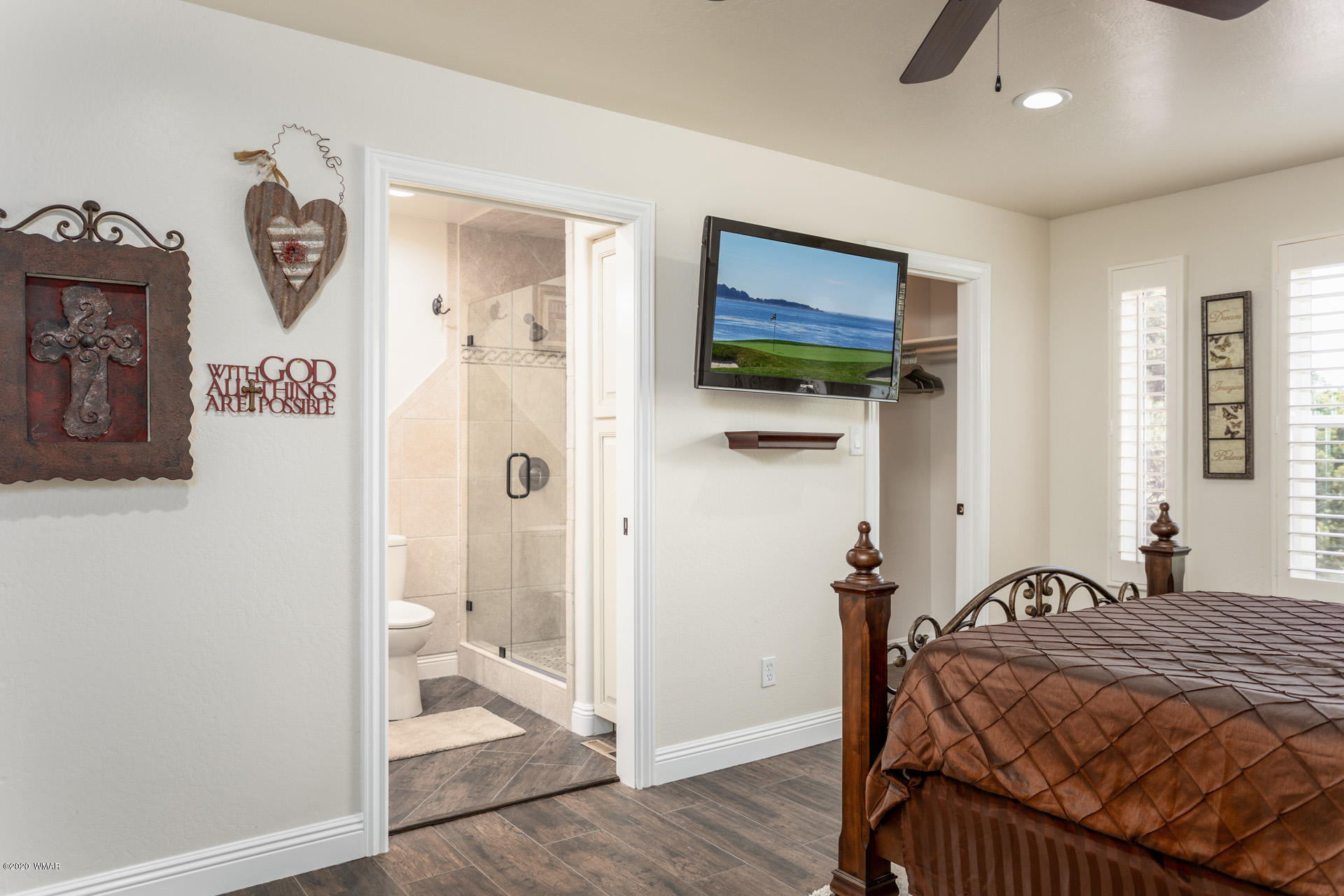 2974 Ranch House Road Overgaard, AZ 85933 - Photo 29 of 46 a bedroom with a bed and a view of bathroom